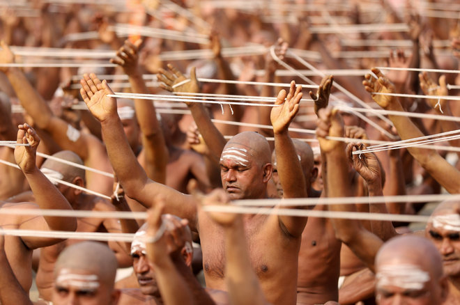 Newly Initiated Naga Sadhus Or Hindu Holy Men Of The Juna Akhara Attend The Dikasha Ritual On The Banks Of The River Ganges During The Ongoing Kumbh Mela In Prayagraj - Shri Niranjani Akhada | श्री निरंजनी अखाड़ा